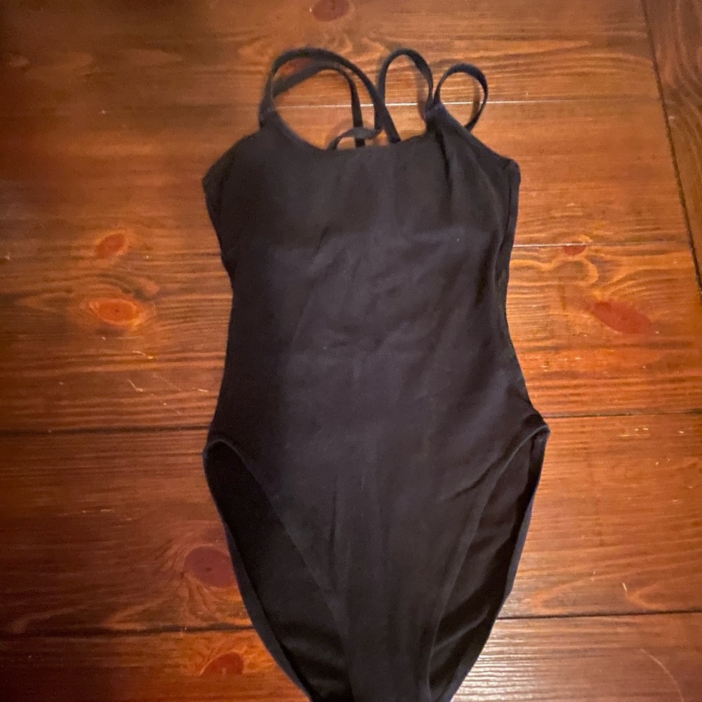 Capezio black spandex leotard size child large. Gently used.